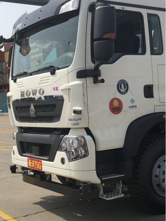 【中國夢·實踐者】全球首臺無人駕駛電動卡車開啟港口試運營
